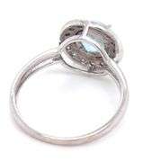 14kt White gold blue topaz and diamond ring
