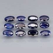 Beautifully colored 3.30ct ink blue Sapphire set