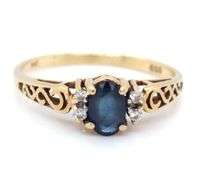 14kt Yellow gold oval blue sapphire and diamond ring