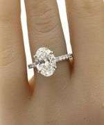 14kt White gold 3.15ct oval lab grown diamond in micro pave ring