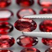 Amazing 8.67ct oval cut red Garnet set