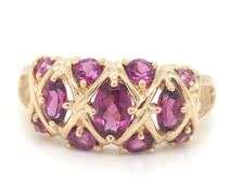 14kt Yellow gold oval and round rhodalite garnet dome ring