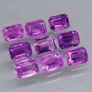 Glittering 8.58ct emerald cut Bolivian Amethyst set