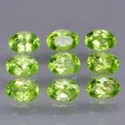 Dazzling 7.14ct untreated apple green Peridot set!