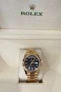 NEW! All original, Rolex Day-Date President 40mm – 18K Yellow Gold with Black Dial & Baguette Diamon