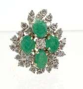 Vintage 18kt white gold emerald and diamond cocktail ring