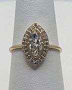 14K gold with 1.10 ctw pearl shape D, VVS1 lab grown diamond ring