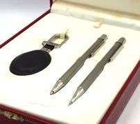 Must De Cartier pen, pencil and key chain set