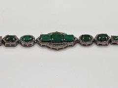Elegant over 6.88ct Natural Colombian Emerald design and 1.66 ct diamond Bracelet-  in Sterling Silv