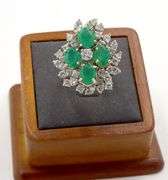 Vintage 18kt white gold emerald and diamond cocktail ring