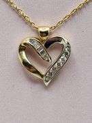 Beatiful 14K yellow gold and diamond heart pendant with chain