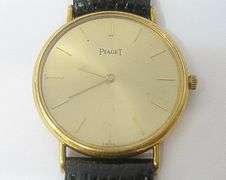 CONTENT OF SAFE DEPOSIT BOX: 18K PIAGET MEN'S WATCH