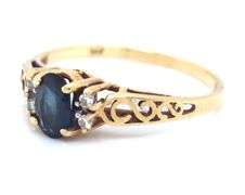 14kt Yellow gold oval blue sapphire and diamond ring
