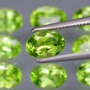 Dazzling 7.14ct untreated apple green Peridot set!