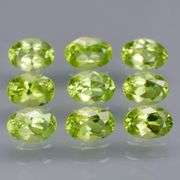 Oval cut! Untreated! Matched! 7.08ct Peridot set!