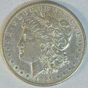 Frosty-white AU 1891-CC Morgan Silver Dollar. Scarce this nice
