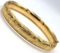 Pretty Patterned 14k yellow gold Opening Bangle