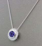 14kt White gold 2.02ct Tanzanite in 0.40ctw diamond halo setting pendant on chain