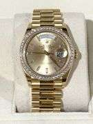 NEW! All original, Rolex Day-Date President 36mm – 18K Yellow Gold with Champagne Dial & Baguette Diamond Markers