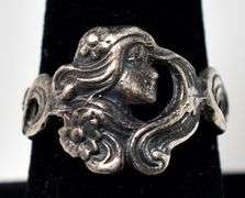 Girl Profile with Flower Detailing in Sterling Silver