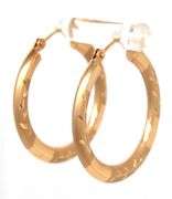 14kt Yellow gold diamond cut hoop earrings