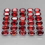 Amazing 8.67ct oval cut red Garnet set