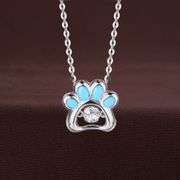 Cute Dog paw center stone pendant in solid sterling silver.with blue enamel in