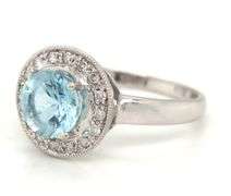 14kt White gold blue topaz and diamond ring