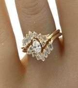 14kt Yellow gold 0.60ctw RBC and baguette diamond engagement ring