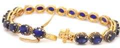 Captivating 19.30CTW Oval Faceted Blue Sapphire & 1.40CTW Diamond Bracelet in 14K Yellow Gold Over S