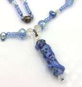 Blue and white crystal rhinestone pendant on beaded necklace