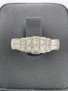 CERTIFIED PLATINUM AND DIAMOND RING.
