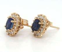 14kt Yellow gold oval blue sapphire halo diamond stud earrings