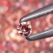 Brilliant 2.55ct diamond cut padparadsha Sapphire set