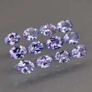 Heavy flashing! Untreated! 2.02ct oval cut Tanzanite set