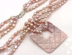 Pearl square pendant on multi strand pearl necklace