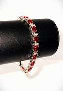 Beautiful 18 Kt White Gold Lab Simulated 16.5 Cttw Red Ruby Tennis Bracelet