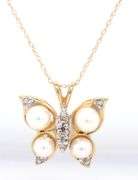 14kt Yellow gold pearl and diamond accent butterfly pendant on chain