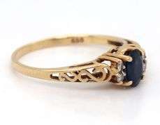 14kt Yellow gold oval blue sapphire and diamond ring