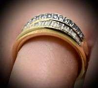 Elegant 14K Yellow Gold Channel-Set Baguette Diamond Ring