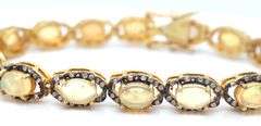 Fabulous 12.10CTW Oval Faceted Opal W/ Fire & Diamond Bracelet in 14K Yellow Gold Over Sterling Silv