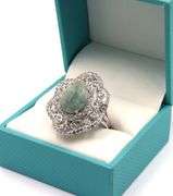 Exquisite 7.75CTS Oval Shaped Cabochon-Cut Emerald & 2.35CTW White Sapphire Ring in Sterling Silver