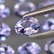 Heavy flashing 2.22ct oval cut Tanzanite set