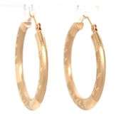 14kt Yellow gold diamond cut hoop earrings