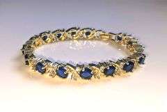 18 K White Gold Plated Huge 12.5 Ctw Lab Simulated Diamond and Blue Sapphire Tennis Bracelet