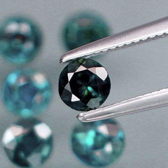 Heated only! 3.14ct blue green Sapphire set