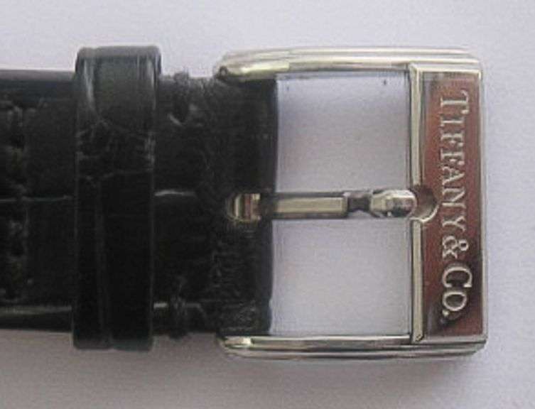 TIFFANY & CO. MEN'S DUAL TIME ZONE WATCH.
