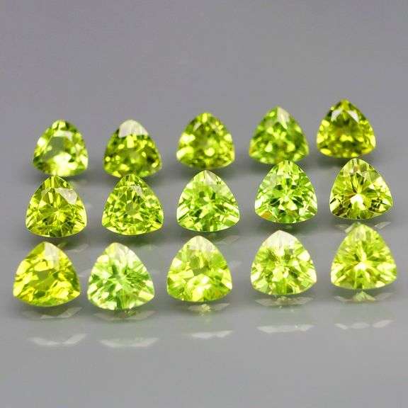 Glittering! 7.76ct 5x5mm trillion cut Peridot set