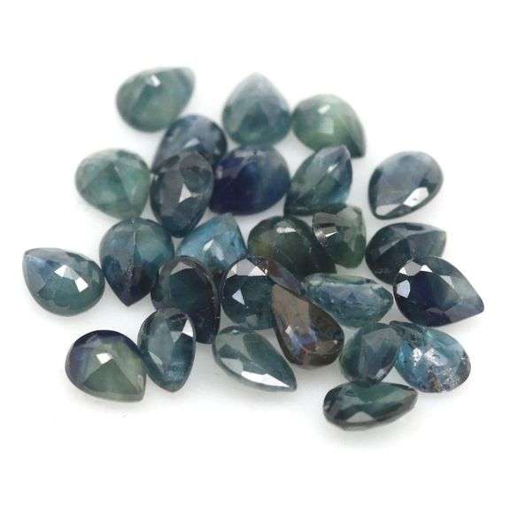 Heated only! 10.94ct blue green Sapphire set
