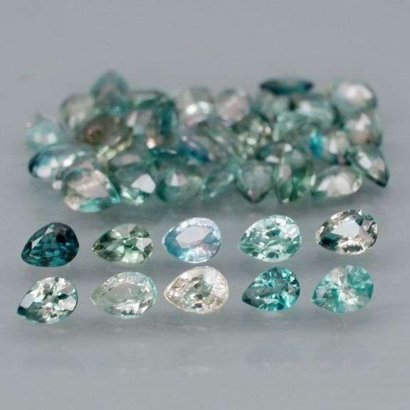 Heated only! 6.10ct blue green Sapphire set!